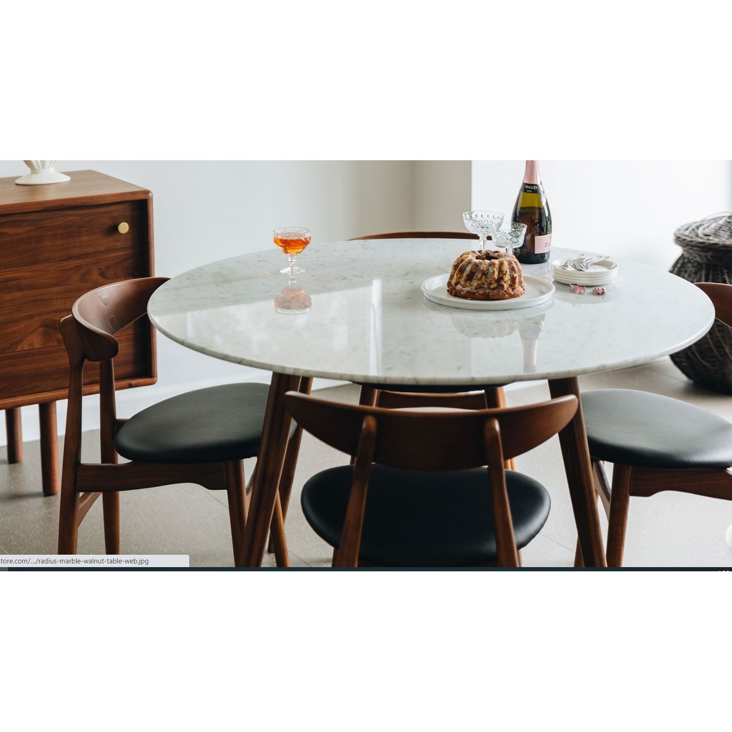Radove marble topped dining table