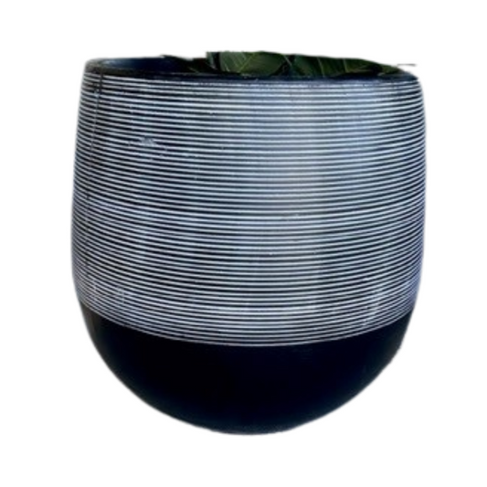 Antique black and white ribbed pot